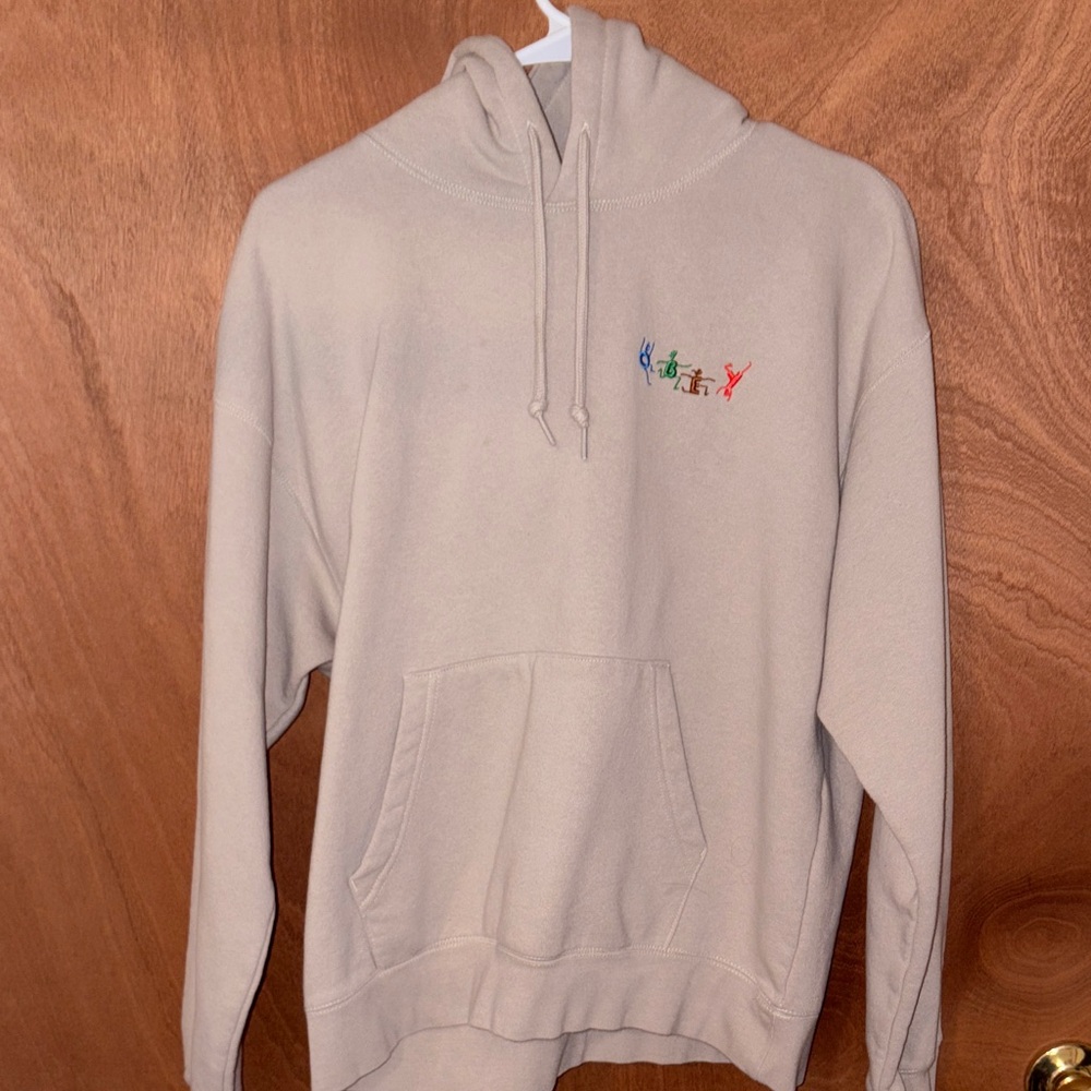 Obey Cream Hoodie with Vibrant Logo